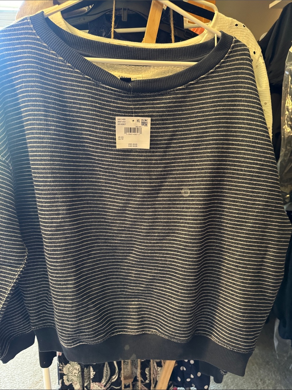 American Eagle Outfitters Women’s Navy and White Striped Crewneck Sweater.